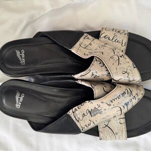 Dansko Women's Black and Cream Mules with French Script